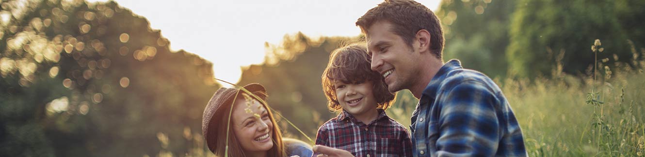 Family on a picnic in a field