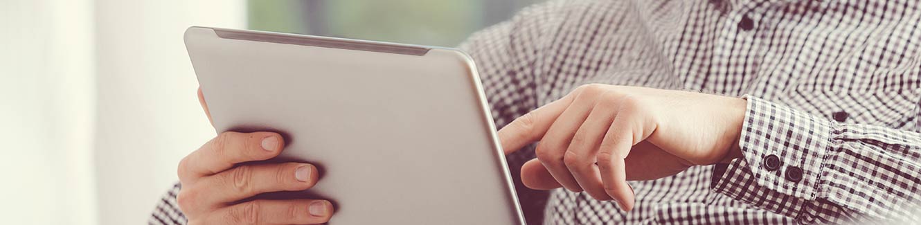 Man using a tablet at work.